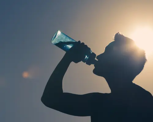 man drinking water